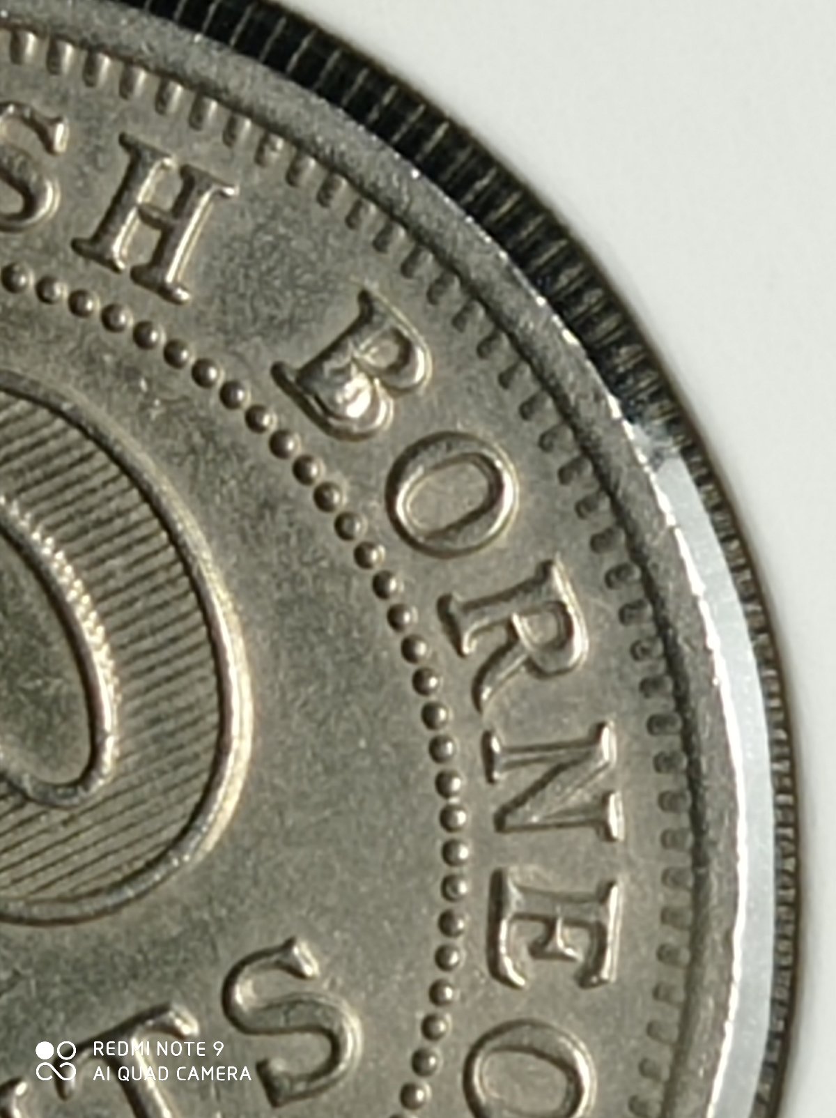 Is-That-An-Error-On-1961-H-Malaya-20¢-Coin?